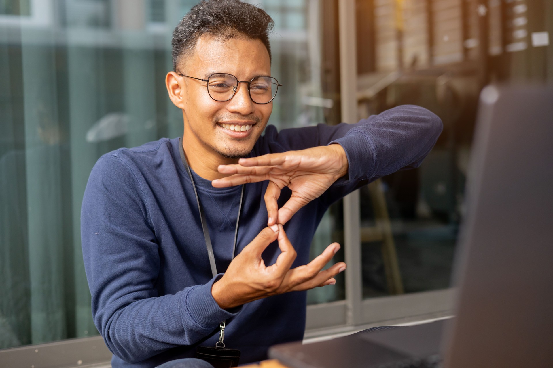close up indian businessman make gesture hand about help sign language to meeting and talking with team from webinar in home for office culture lifestyle concept