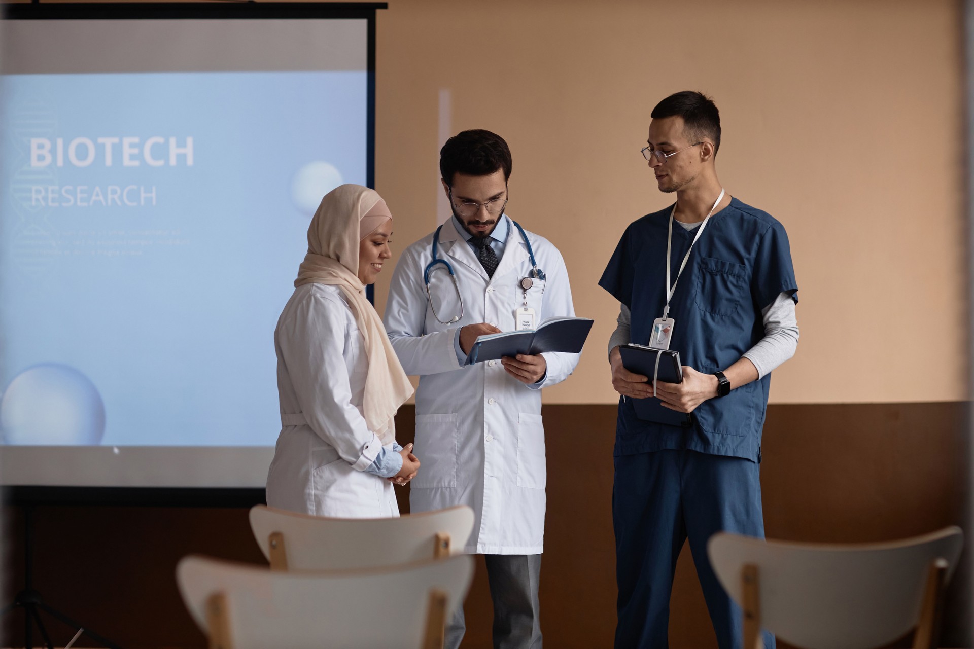 Medical Specialists Discussing Presentation Material