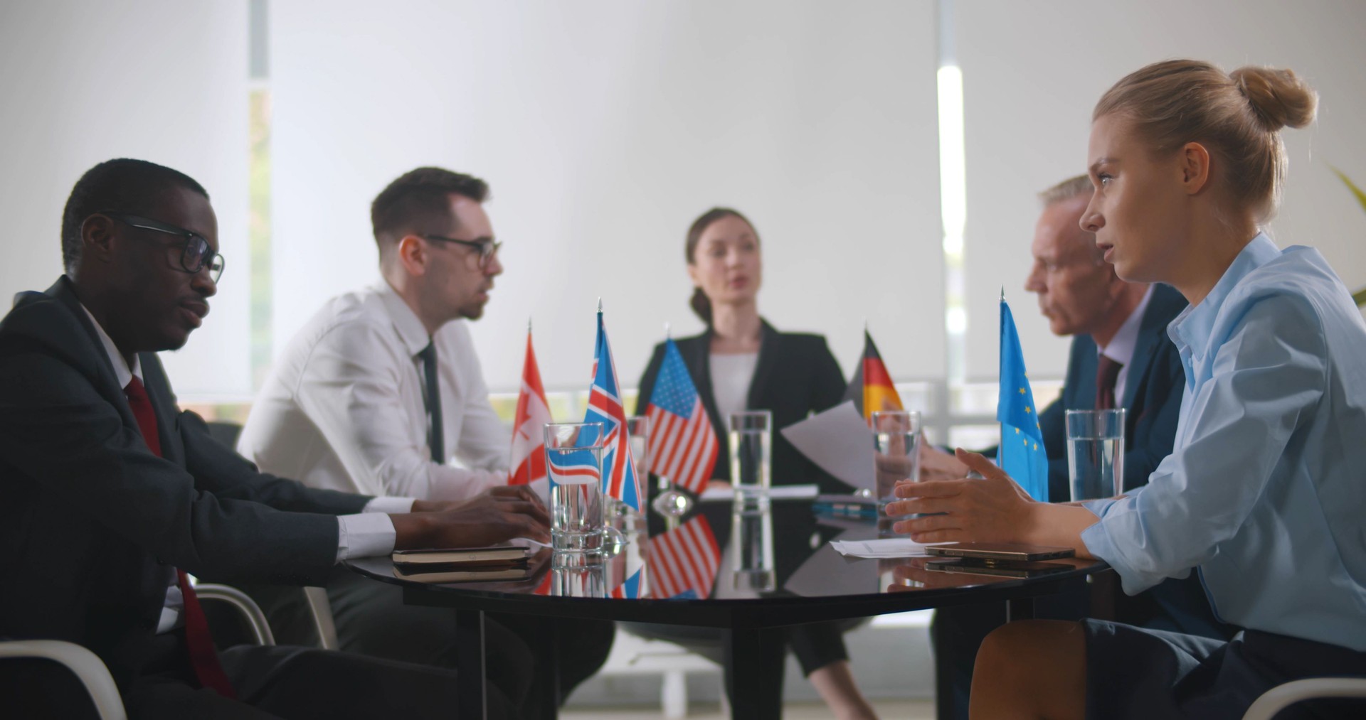 Multicultural business people meeting and talking in modern office